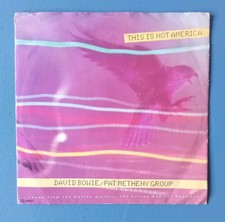Disco 45 giri  7" David Bowie, Pat Metheny - This is not America - EMI (1985)
