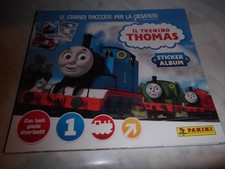 ALBUM FIGURINE VUOTO IL TRENINO THOMAS( DUE FIGURINE)