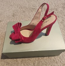 Scarpe tacco h 11 cm con doppio fiocchetto chiuse d'avanti, aperte dietro con la