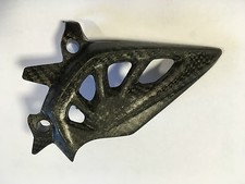 protezione pignone in carbonio