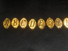 LETTERA CIFRA METALLO COL. ORO DA CUCIRE 2 x 1,5 cm x CIFRARE PELLICCIA ABITI