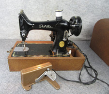 Macchina da cucire portatile e