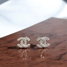 Orecchini Doppia C In Argento 925 e Zirconi.