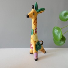 Statuina giraffa treppiede