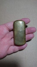 Antico accendino in ottone