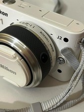 Nikon 1 J2 + obiettivo 11-27.5 PARI AL NUOVO - AS NEW