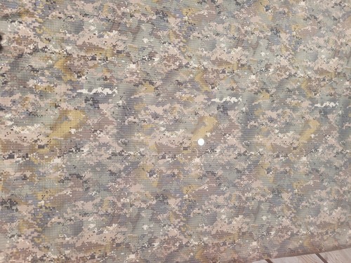 Materiale tessuto mimetico