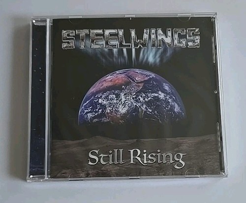 Steelwings still rising - still, (cd)