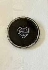 COPRIMOZZO RUOTA LANCIA YPSILON DAL 2012 COLORE NERO CON BORDO CROMATO