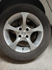 4 cerchi auto in lega con copertoni invernali 195/65/15 usati a 100 euro 
