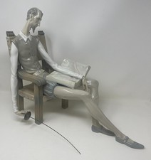 Statuina porcellana Lladro Don Chisciotte lettura con sedia maestosa e spada Spagna