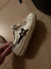 Sneakers bianche con stella
