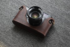 Custodia mezza fotocamera in