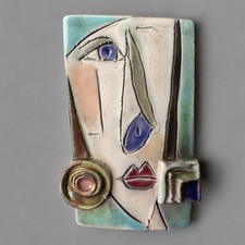 Grande spilla faccia cubista