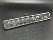 INNOCENTI MILLE 1.0 I.E LOGO SIGLA EMBLEMA FREGIO STEMMA SCRITTA TARGHETTA BADGE