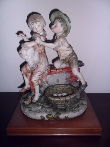 Deliziosa statua porcellana - in,