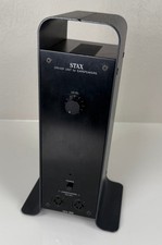 Amplificatore per cuffie Stax SRM-300 che funziona anche come supporto per cuffie