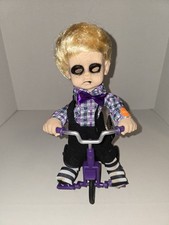 Bambola Triciclo Animata