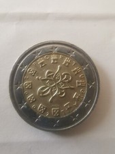 Una moneta euro circolata - moneta,