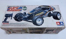 Auto radiocomandata batterie TAMIYA Quick Drive R/C Model SUPER SABRE (vintage)