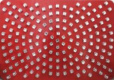 scultura geometrica, tappi cosmetici, optical art, rosso argento, dipinto 3D