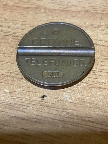 Gettone telefonico 7801 - gettone, logo
