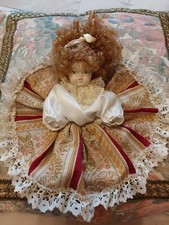 Bambola in ceramica vintage,