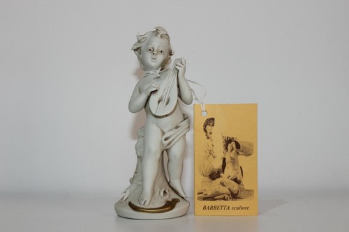 Bambino con liuto scultore