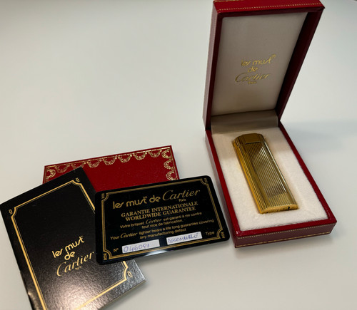 Accendino cartier godron oro - cartier,