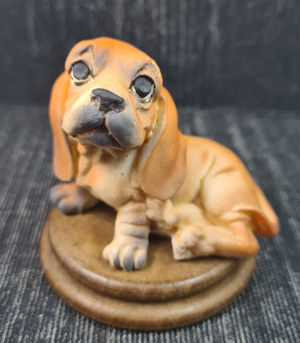Scultura resina cane - in,