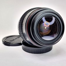 Tokina 28-70 mm AF f/3.5-4.5 obiettivo zoom Minolta/Sony attacco A, con tappi, ottime condizioni