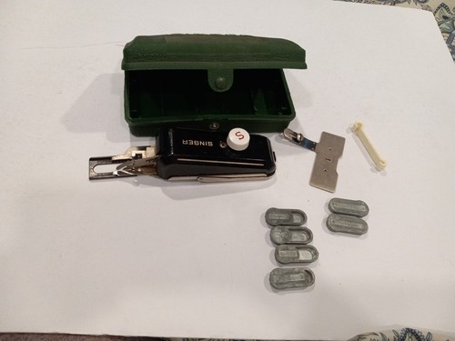 Singer sewing machine - singer, button