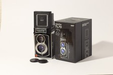 Fotocamera istantanea biottica