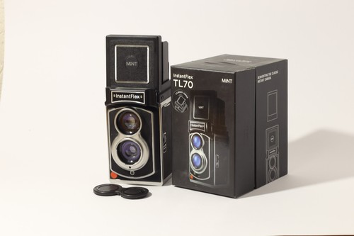 Fotocamera istantanea biottica