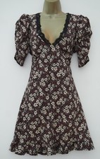 ABITO DA TÈ NERO CON