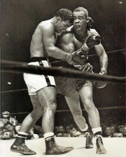 ROCKY MARCIANO KO's JOE LOUIS