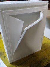 Lampada breccia nel muro