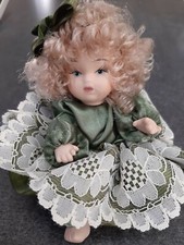 Bambole porcellana snodabili