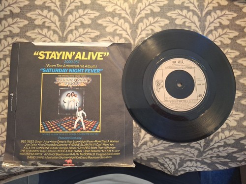 Bee gees stayin alive pic - "stayin',