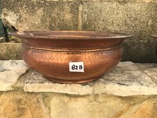 Portavasi in rame stile