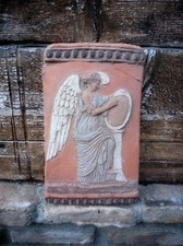 BASSORILIEVO MUSA TERRACOTTA