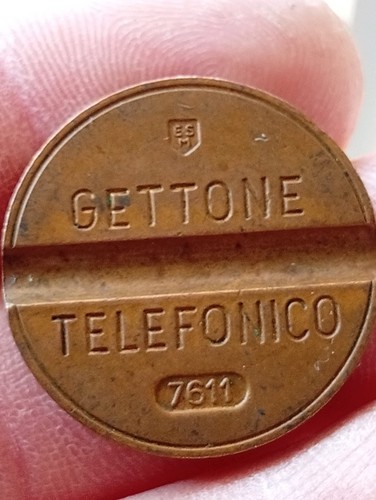 Gettone telefonico 7611 - 7611, segno