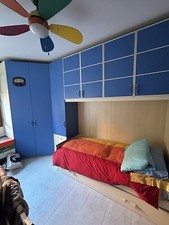 armadio in legno a 9 ante