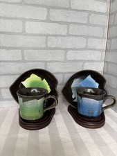 Set di tazze e piattini in