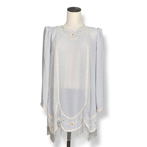 Blusa tunica impreziosita
