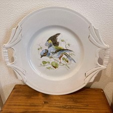 Antico piatto uccellino, bordo