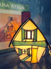 Forma Vitrum Badger House