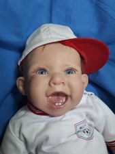 Realistico bambolotto Reborn in silicone, viso sorridente, bellissimo