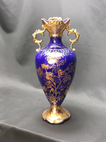 Antico vaso floreale dorato