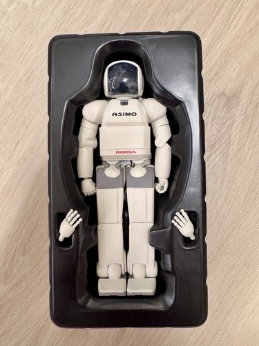 Robot action figure honda - robot,